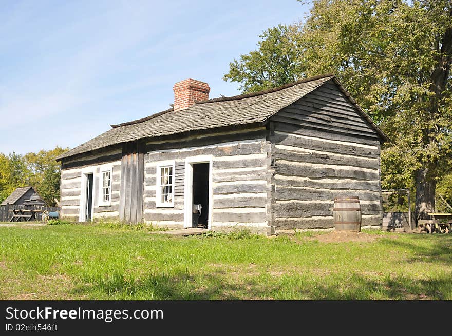 Replica of Thomas Lincoln's log cabin. He was the father of President Abraham Lincoln. In 1893, the original Thomas Lincoln log cabin was disassembled and shipped northward to serve as an exhibit at the World's Columbian Exposition in Chicago, Illinois. The original cabin was lost after the Exposition, and may have been used as firewood. However, the cabin had been photographed many times, and an exact replica was built from the photographs and from contemporary descriptions. The reconstruction of the Thomas Lincoln log cabin was completed in 1934.