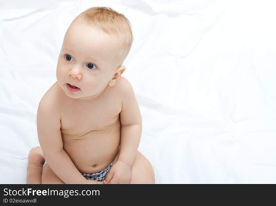 The portait of little baby boy on white. The portait of little baby boy on white