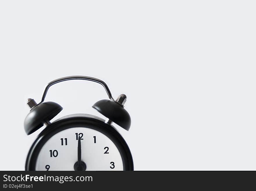 An alarm clock on white background