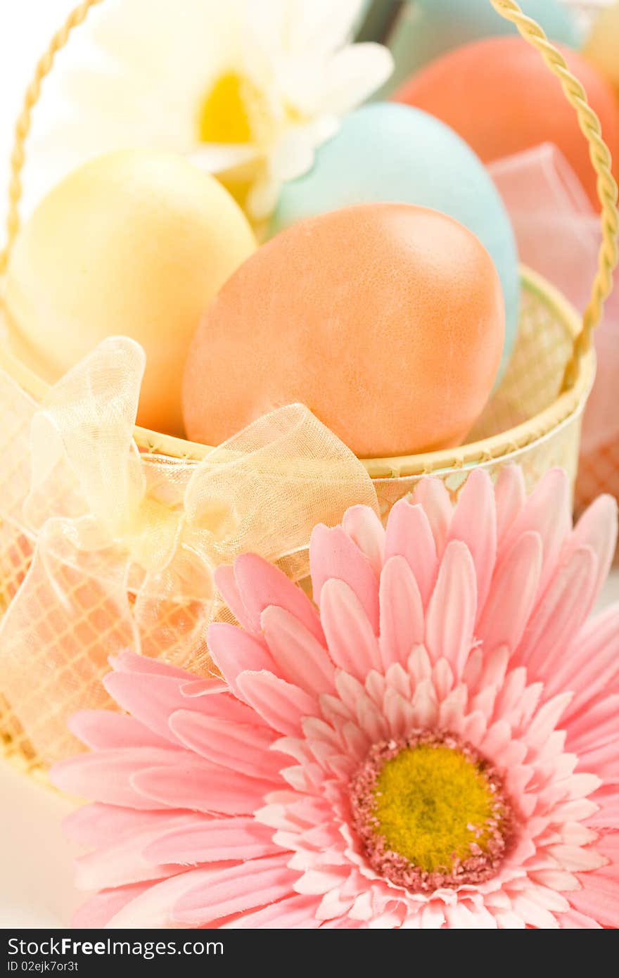 Colorful easter arrangement with flowers and eggs