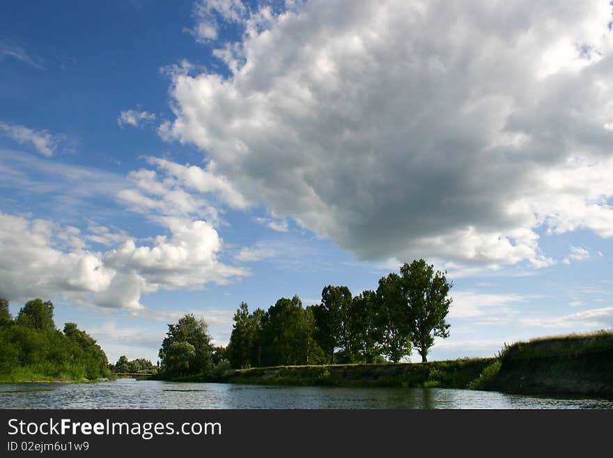 An image of big cloud over the river