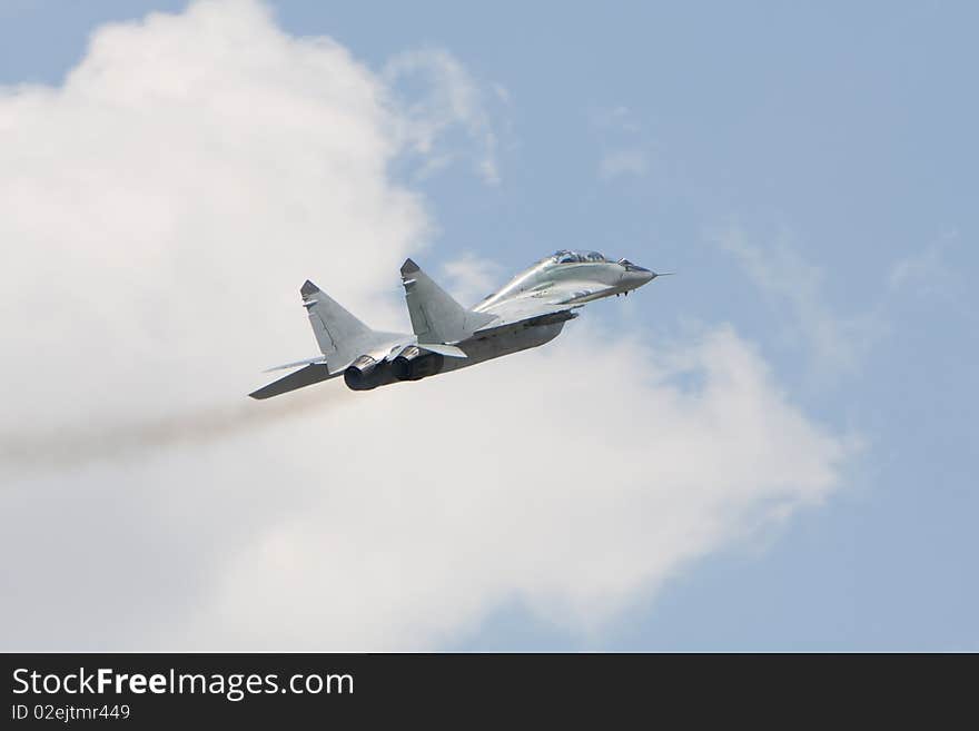 Russian military airplane flying in a blue sky. Russian military airplane flying in a blue sky