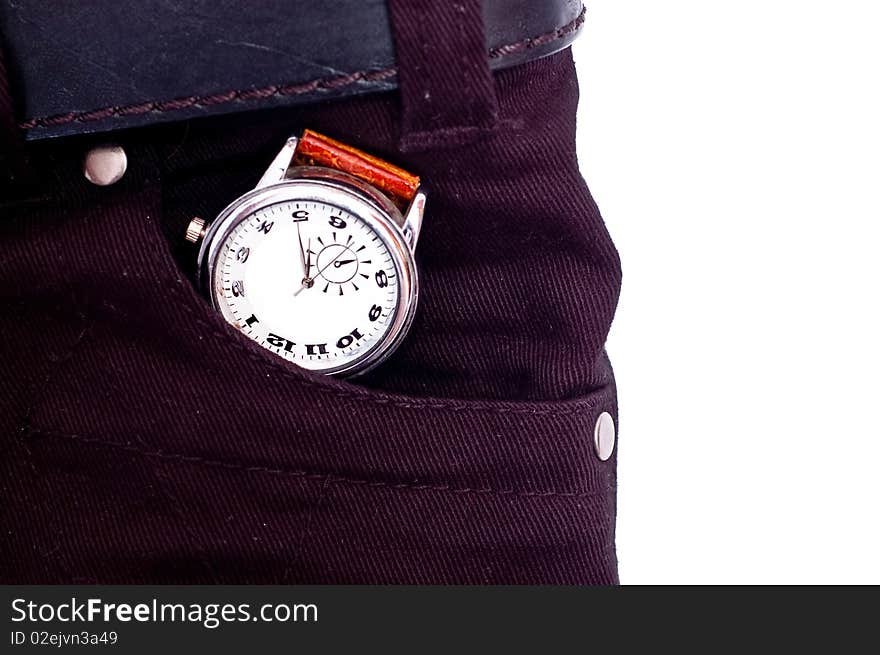 Silver watch in black jeans pocket isolated on white. Silver watch in black jeans pocket isolated on white