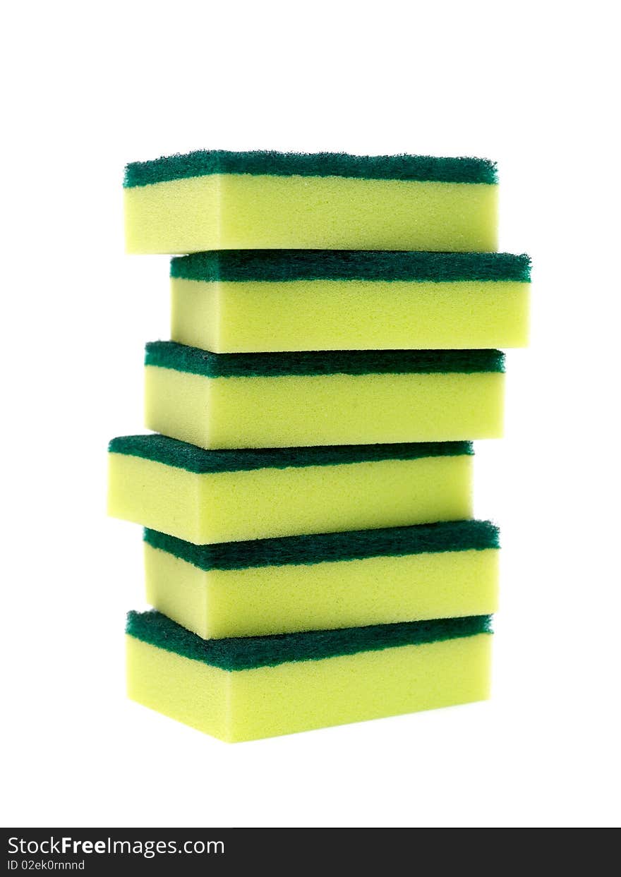 Household scourers stacked and isolated against a white background