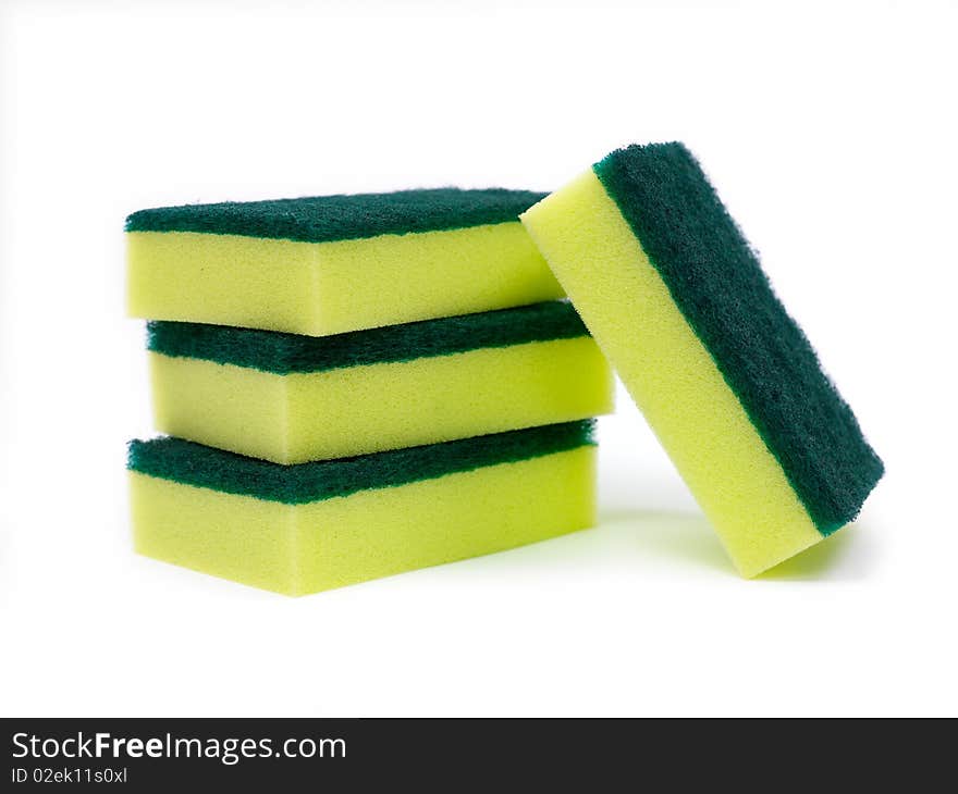 Household scourers stacked and isolated against a white background