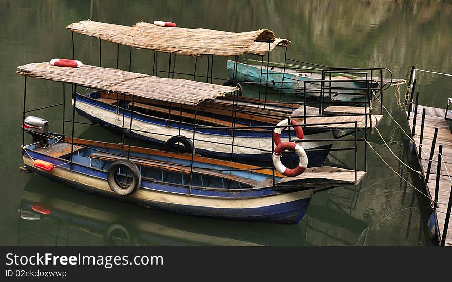 A peaceful image of docked boats at lake of Matka -Skopje