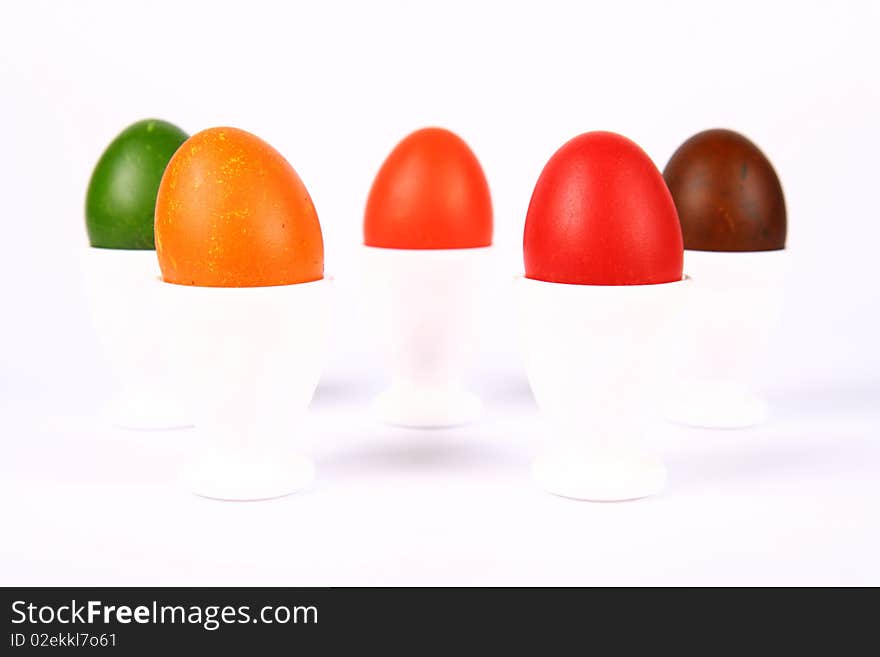 Colorful eggs in egg holders