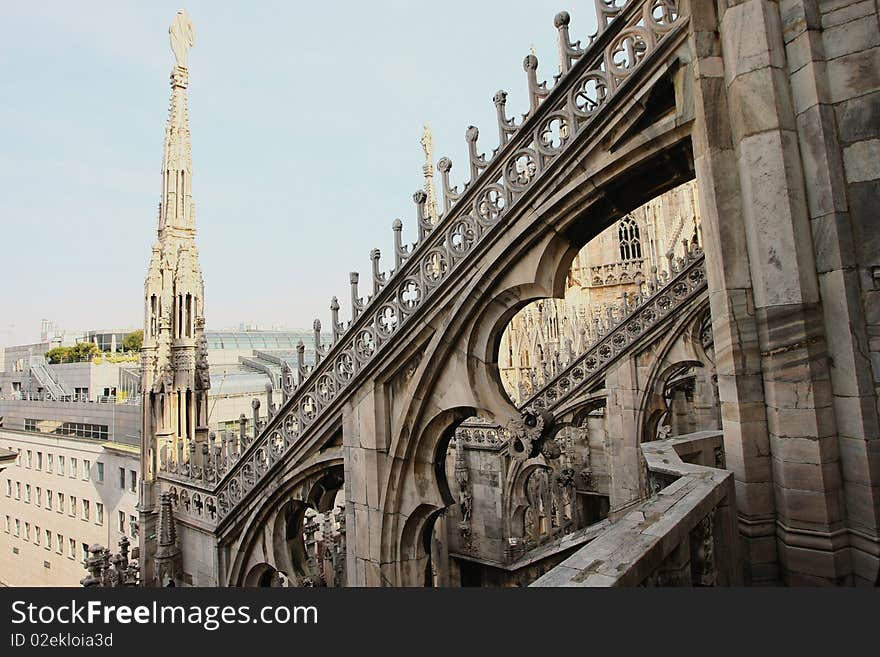 Roof of duomo cathedral in spring, milan, italy