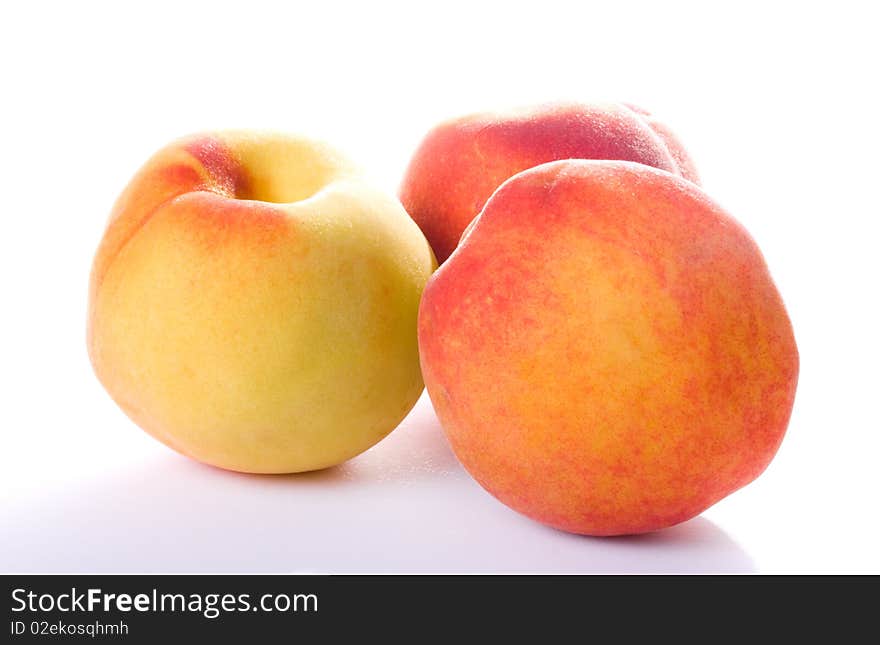 Juicy Peaches isolated on white