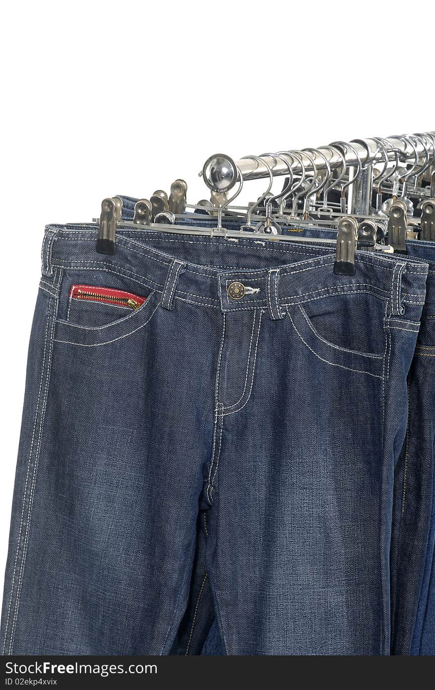 Fashion blue jeans on rack