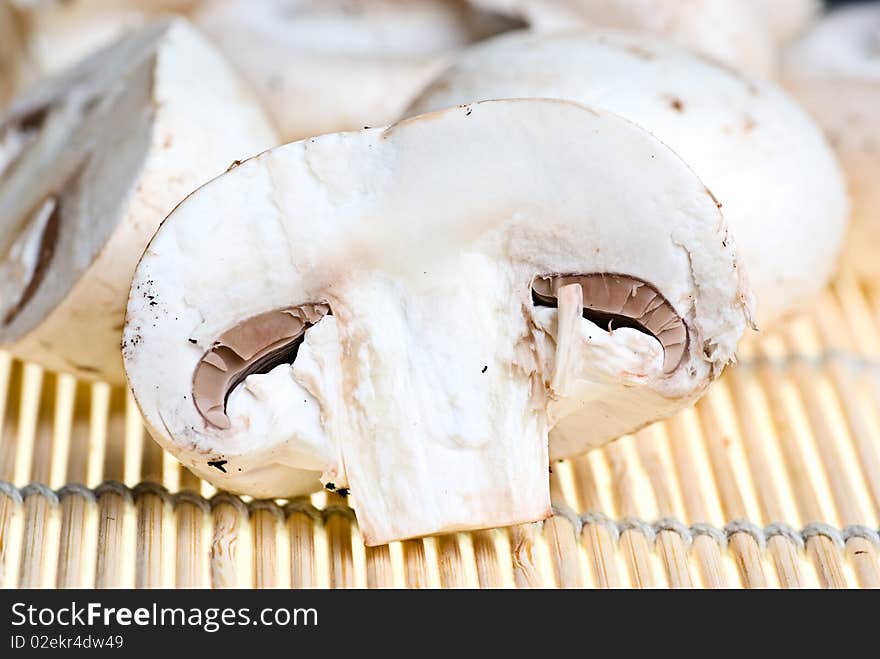 Half of champignon on table