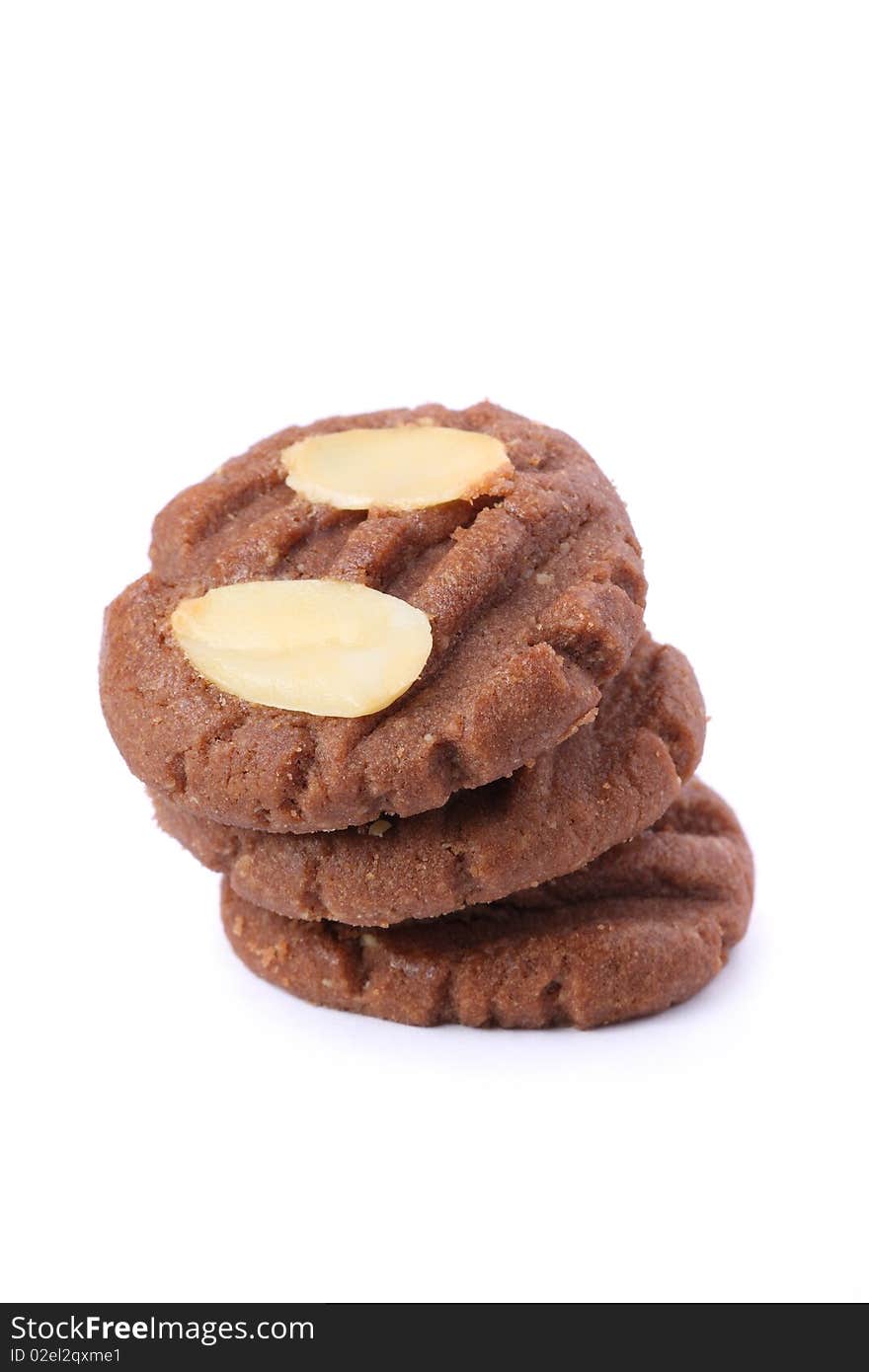 Few pieces of almond cookies isolated on white background.