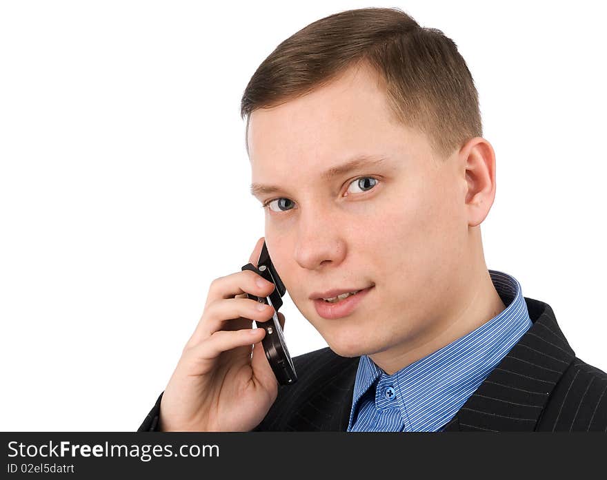 Businessman talking on his mobile phone isolated on a white