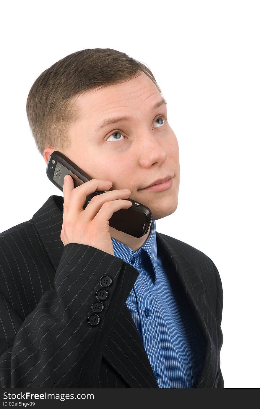 Businessman talking on his mobile phone isolated on a white