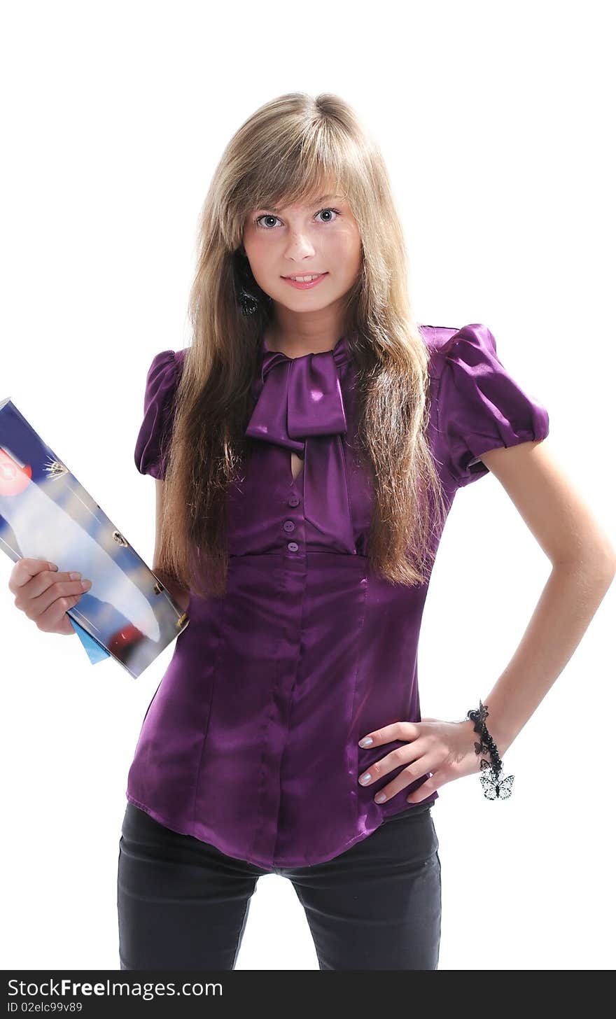 The young beautiful girl with a fair hair in a grey dress separately on a white background