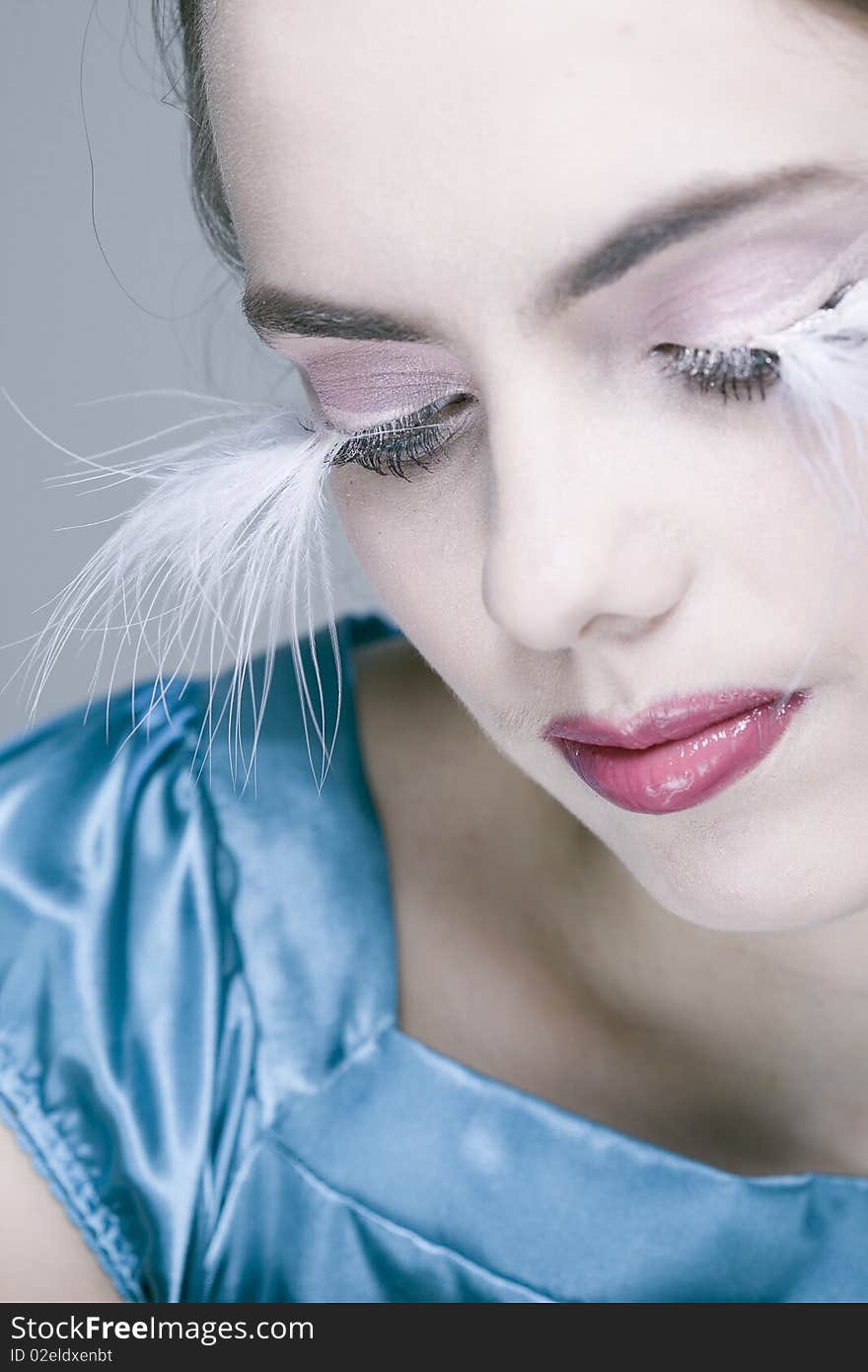 Portrait of young pretty woman with closed eyes and long white eyelashes. Portrait of young pretty woman with closed eyes and long white eyelashes