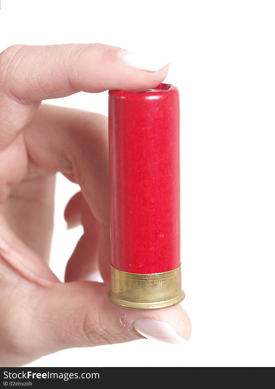 Girl is holding a bullet on white background