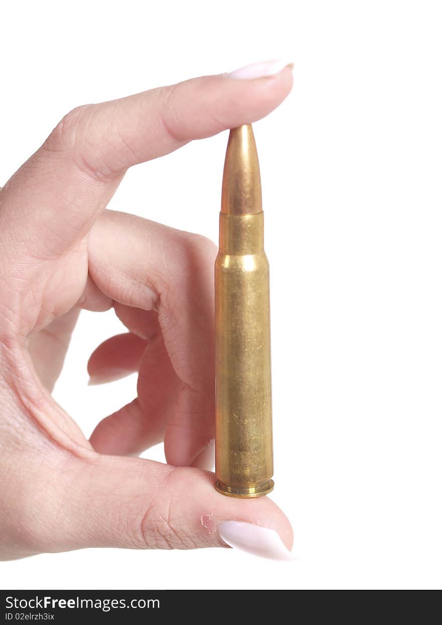 Girl is holding a bullet on white background