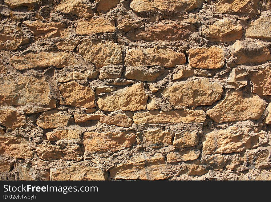 Close up of a brown stone wall