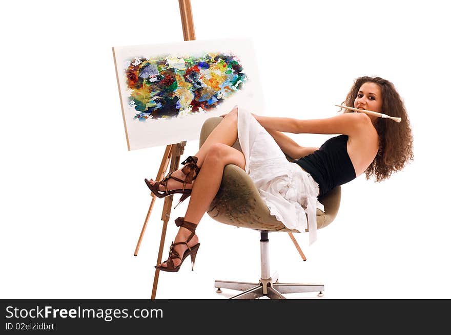 Young woman at atelier with canvas. Young woman at atelier with canvas