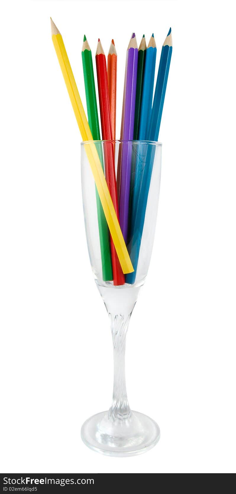 A glass with colored pencils isolated on a white background