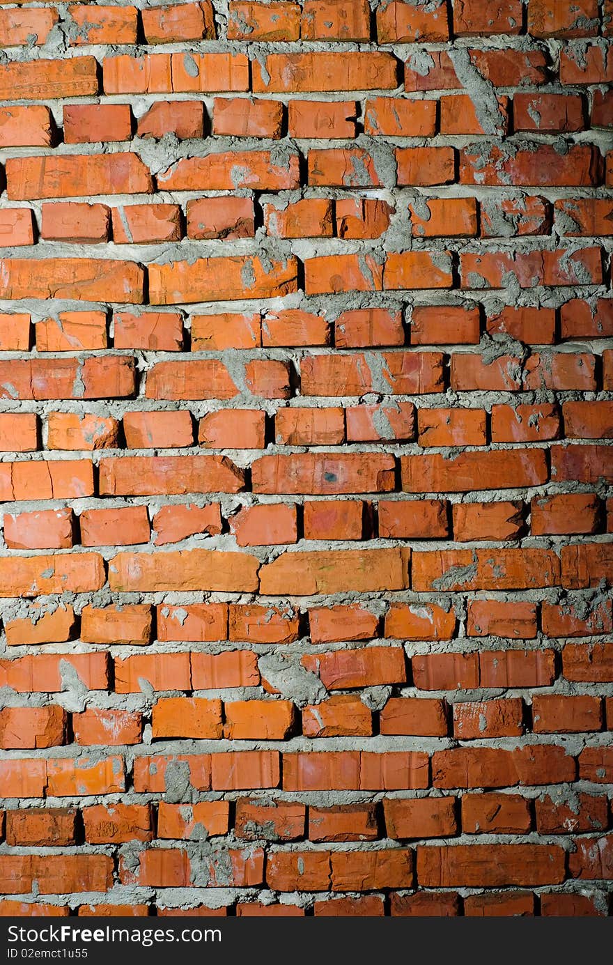 Brick wall with cement close up. Dirty.