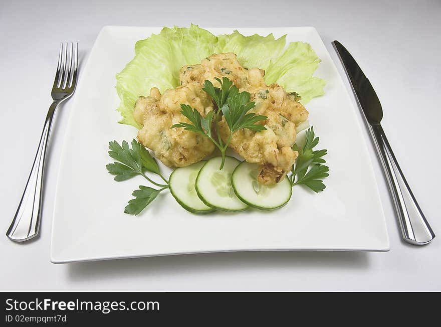 Fish patties with a side salad. Healthy, delicious seafood. Fish patties with a side salad. Healthy, delicious seafood