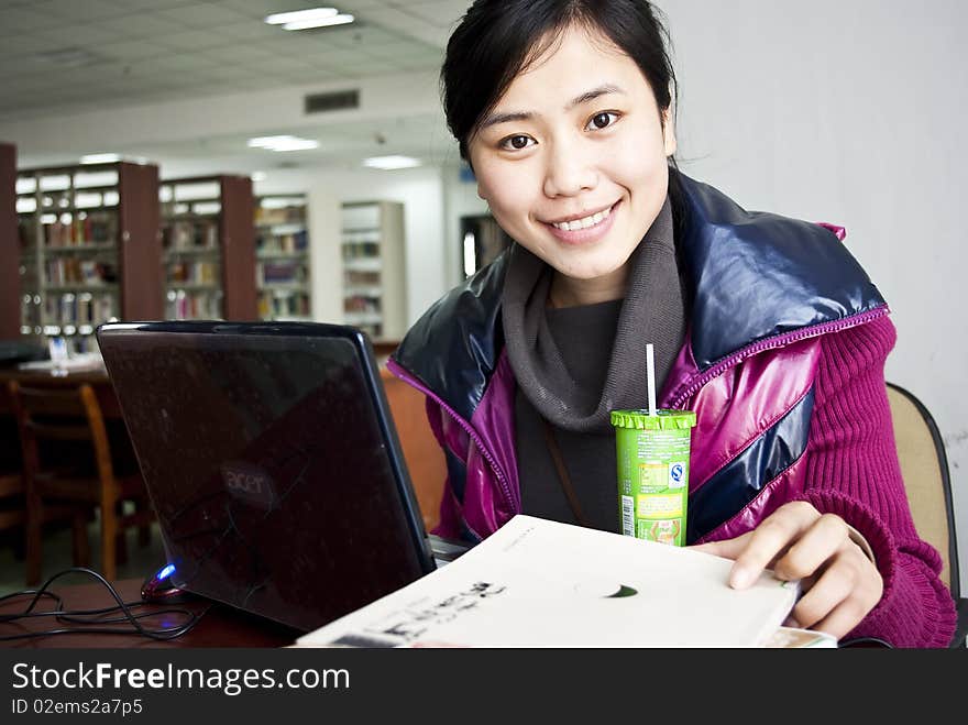 I take this picture in our school library,she is my good friend,she is very beautiful. I take this picture in our school library,she is my good friend,she is very beautiful.