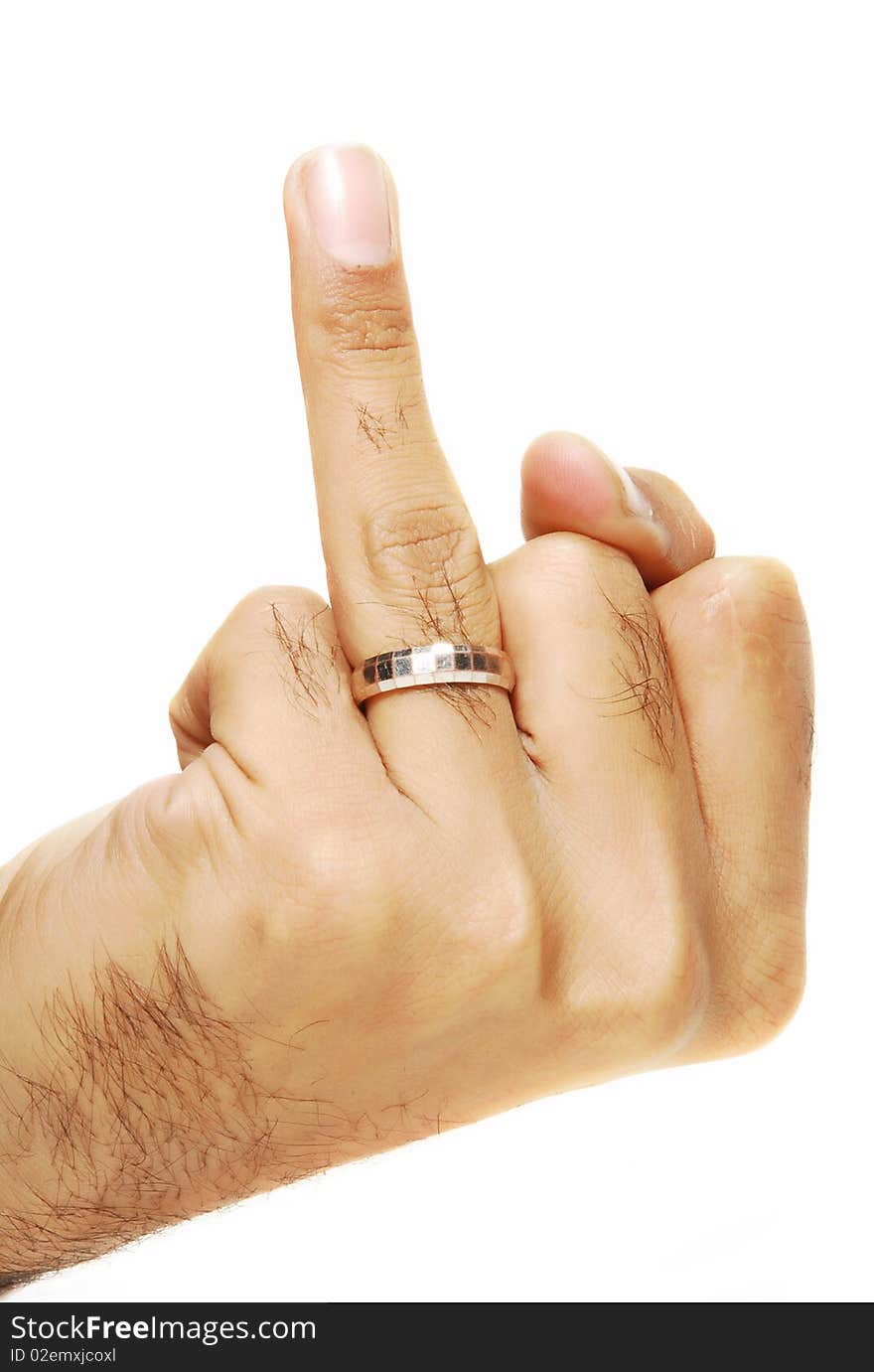 This is a beautiful silver ring wearing in a men finger isolated on a white background. This is a beautiful silver ring wearing in a men finger isolated on a white background.