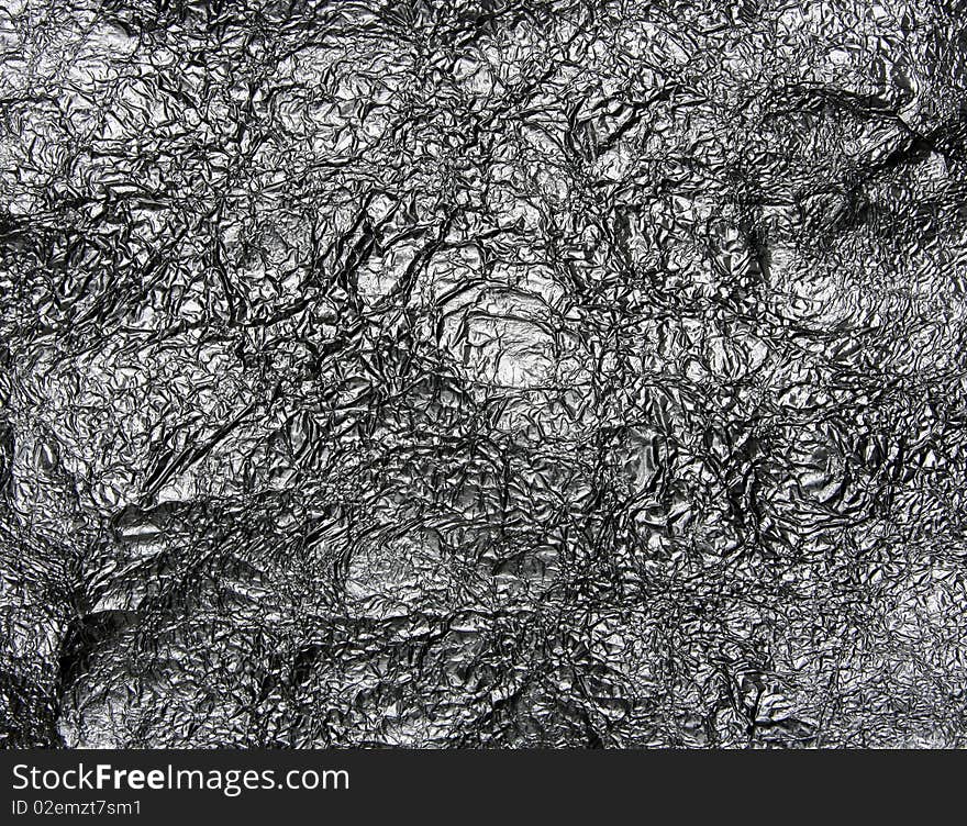 Background of crumpled metal foil