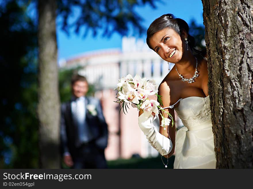 Bride and groom in park