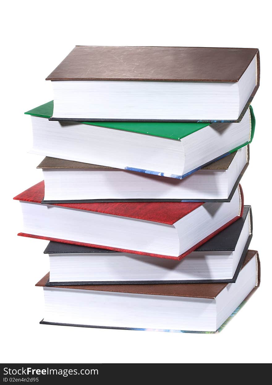 Stack of books on white background