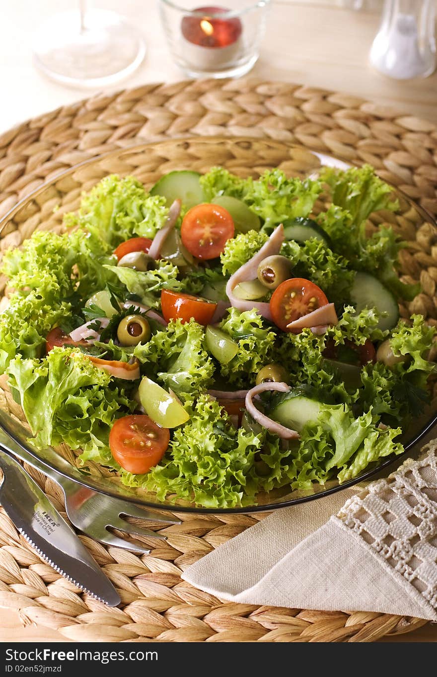 Healthy green salad Isolated on white.