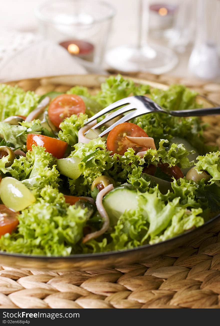 Healthy green salad Isolated on white.