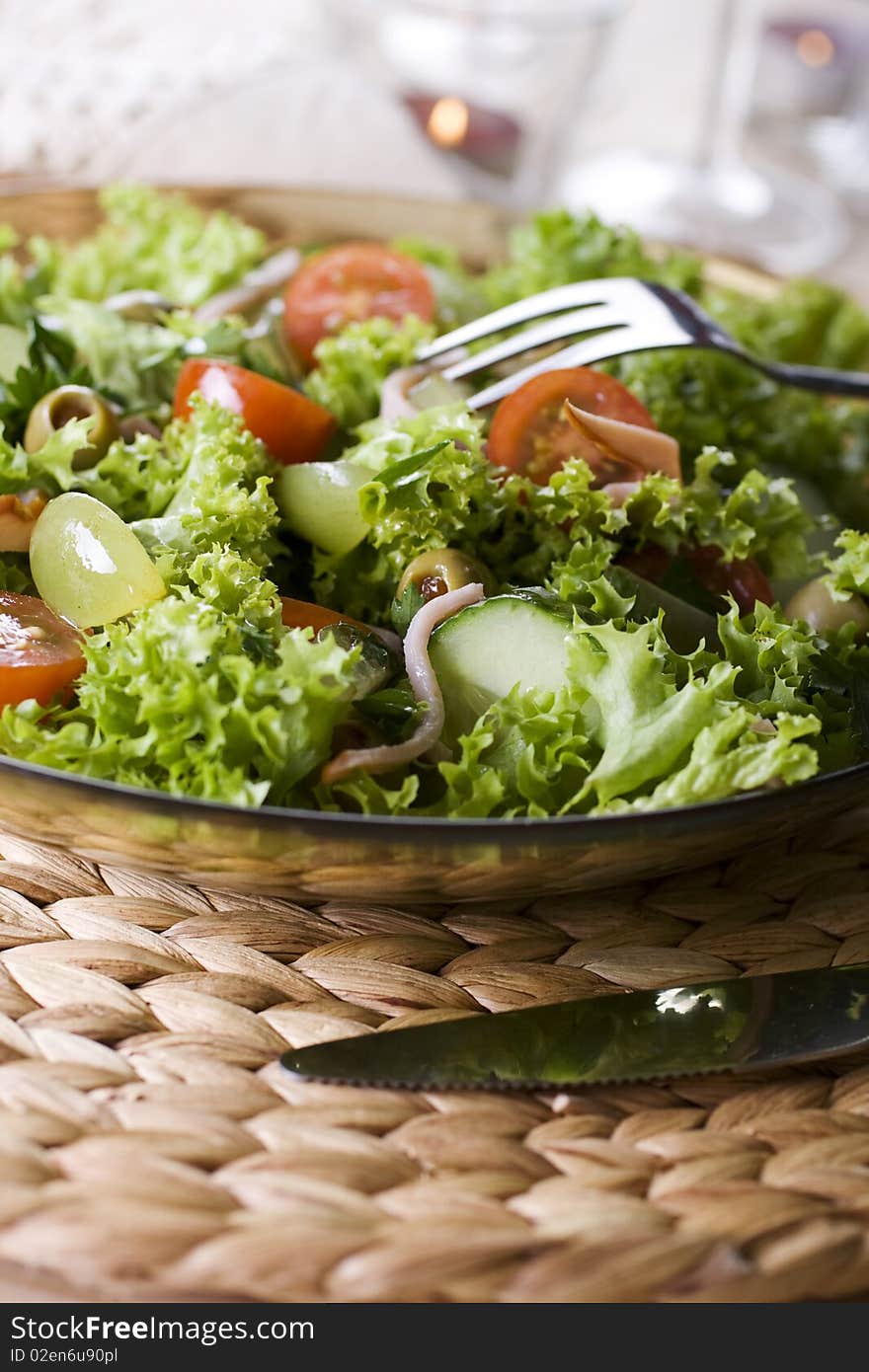 Healthy green salad Isolated on white.