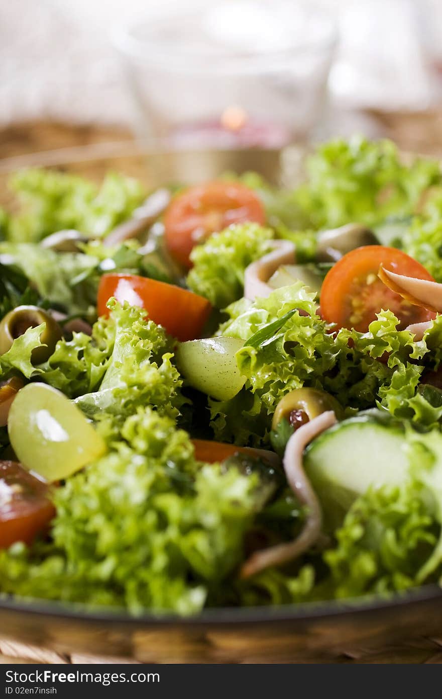 Healthy green salad Isolated on white.