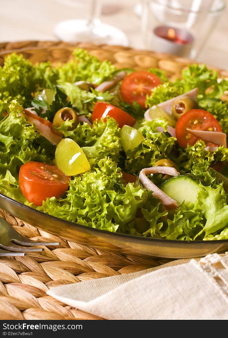 Healthy green salad Isolated on white.