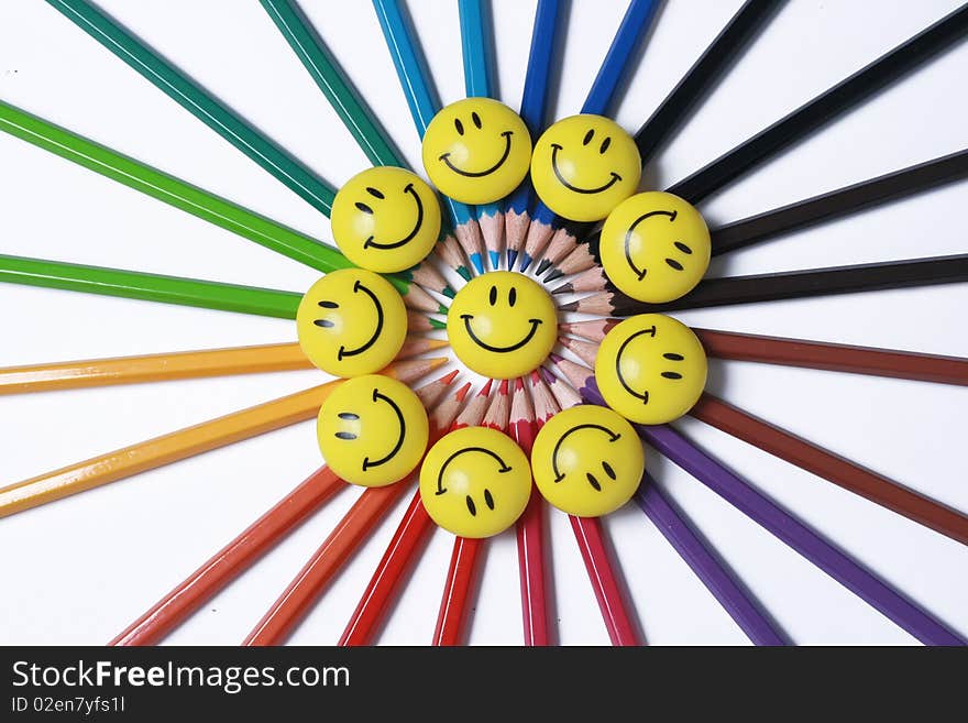 Assortment of colored pencils with shadow on white background - colored crayons