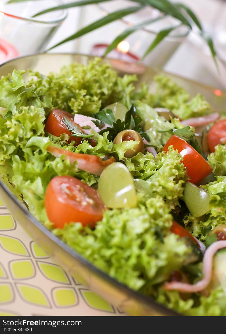 Healthy green salad Isolated on white.