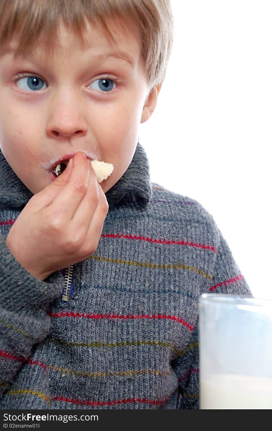 Boy eating bread