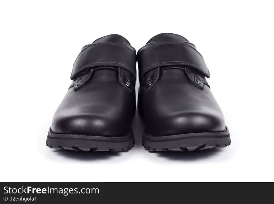 Man's boots isolated on a white background shadow below. Man's boots isolated on a white background shadow below.