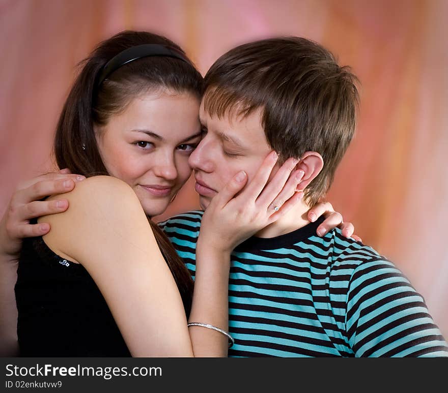 Close up portrait enamoured couple in studio. Close up portrait enamoured couple in studio