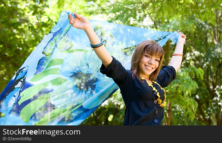 Portrait young girl in blue outdoor