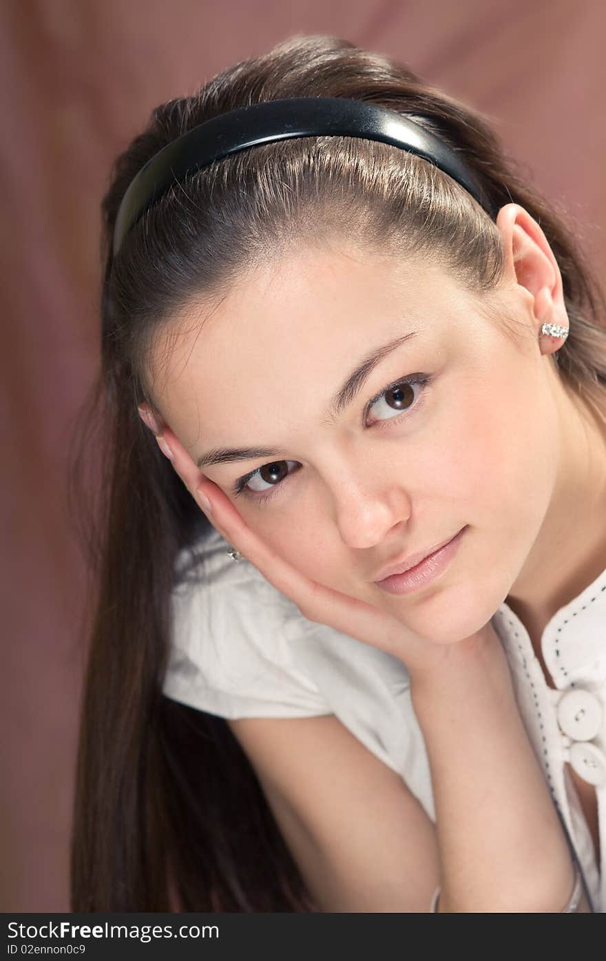 The young beautiful woman in a white dress