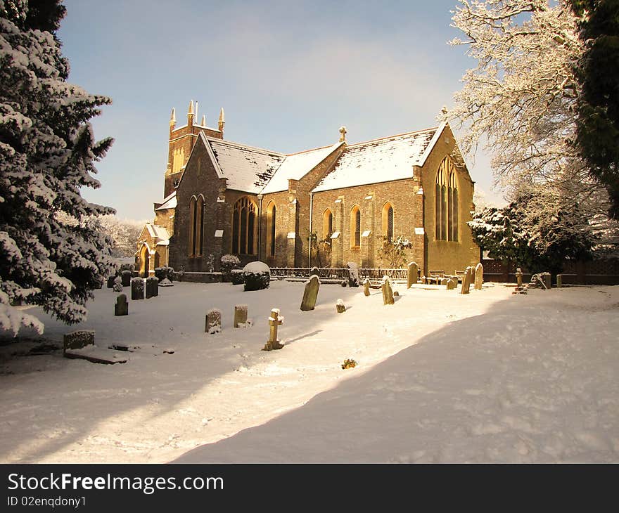 A english church, covered in snow. A english church, covered in snow