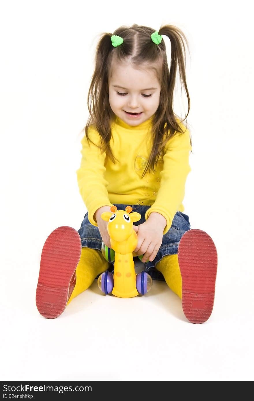 Little girl with toy