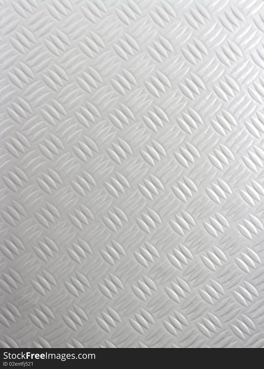 A silver metallic steel background