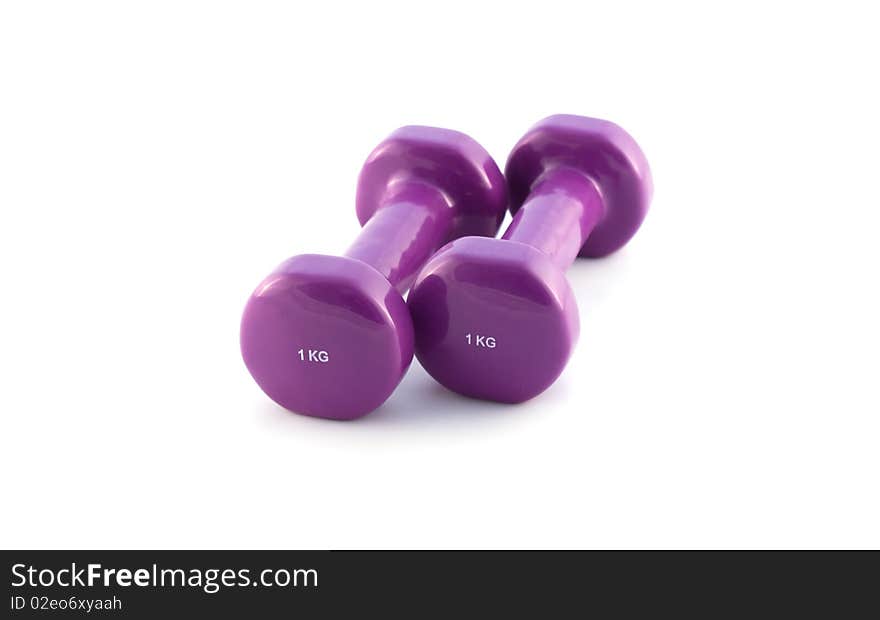 Violet dumbbells on white background