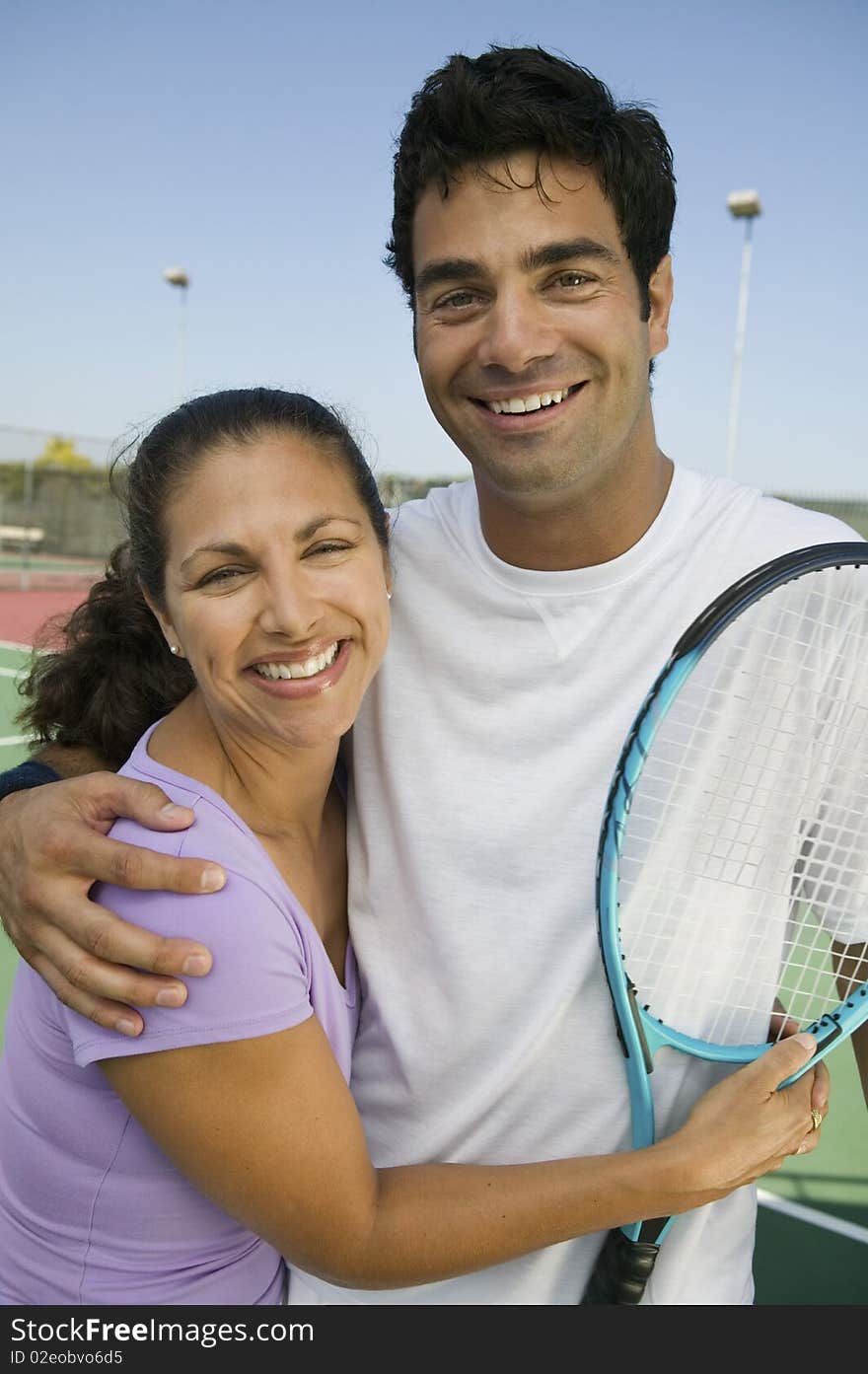 Mixed doubles Tennis Players on tennis court