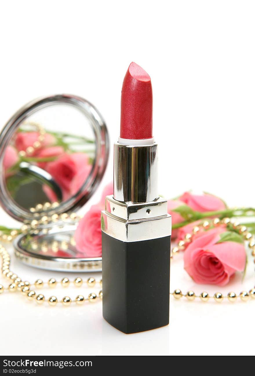 Decorative cosmetics and roses